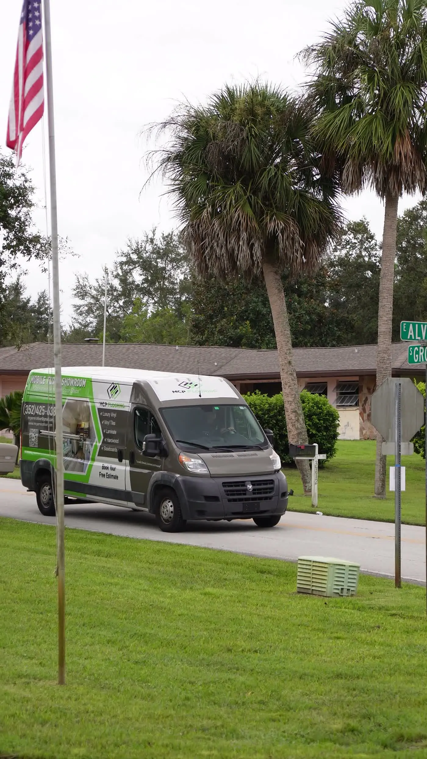 The MCP Flooring van on a residential street in a Lake County, FL neighborhood we serve