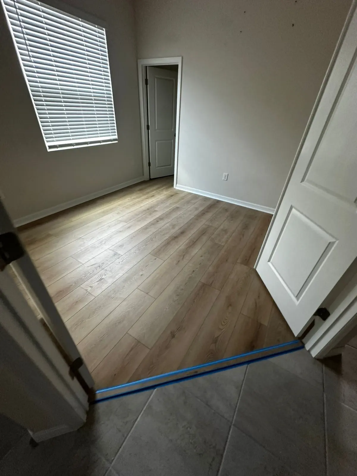 Waterproof luxury vinyl plank floor installed over the existing floor in a Belleview, FL home
