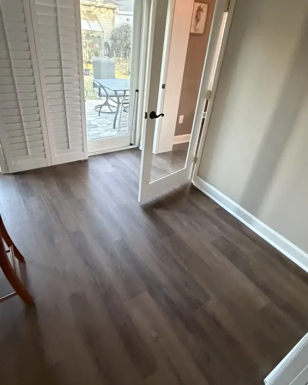 Entry and hallway in wood-look luxury vinyl plank