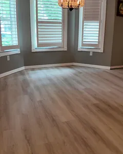 Finished dining room with new wood-look luxury vinyl plank